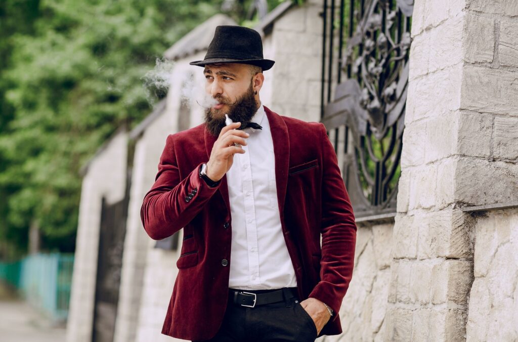 man smoking cannabis vape